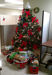Food baskets under Christmas tree