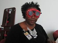 Photo of participant wearing simulator goggles at Lunch N Learn